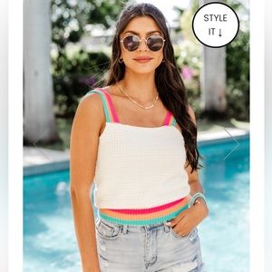 Crochet tank. Lined ! Fabric  has no stretch. Runs slightly small.